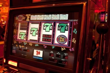 koi77 mobile app interface showing slot tournaments and live casino options